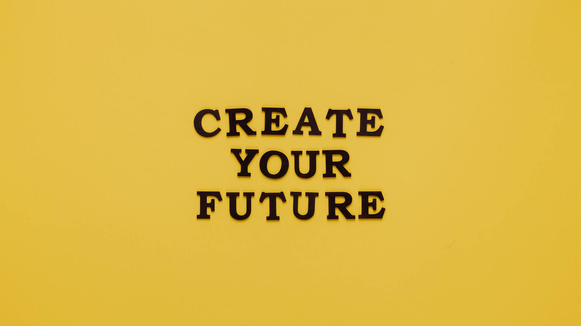 text on yellow background: create your future