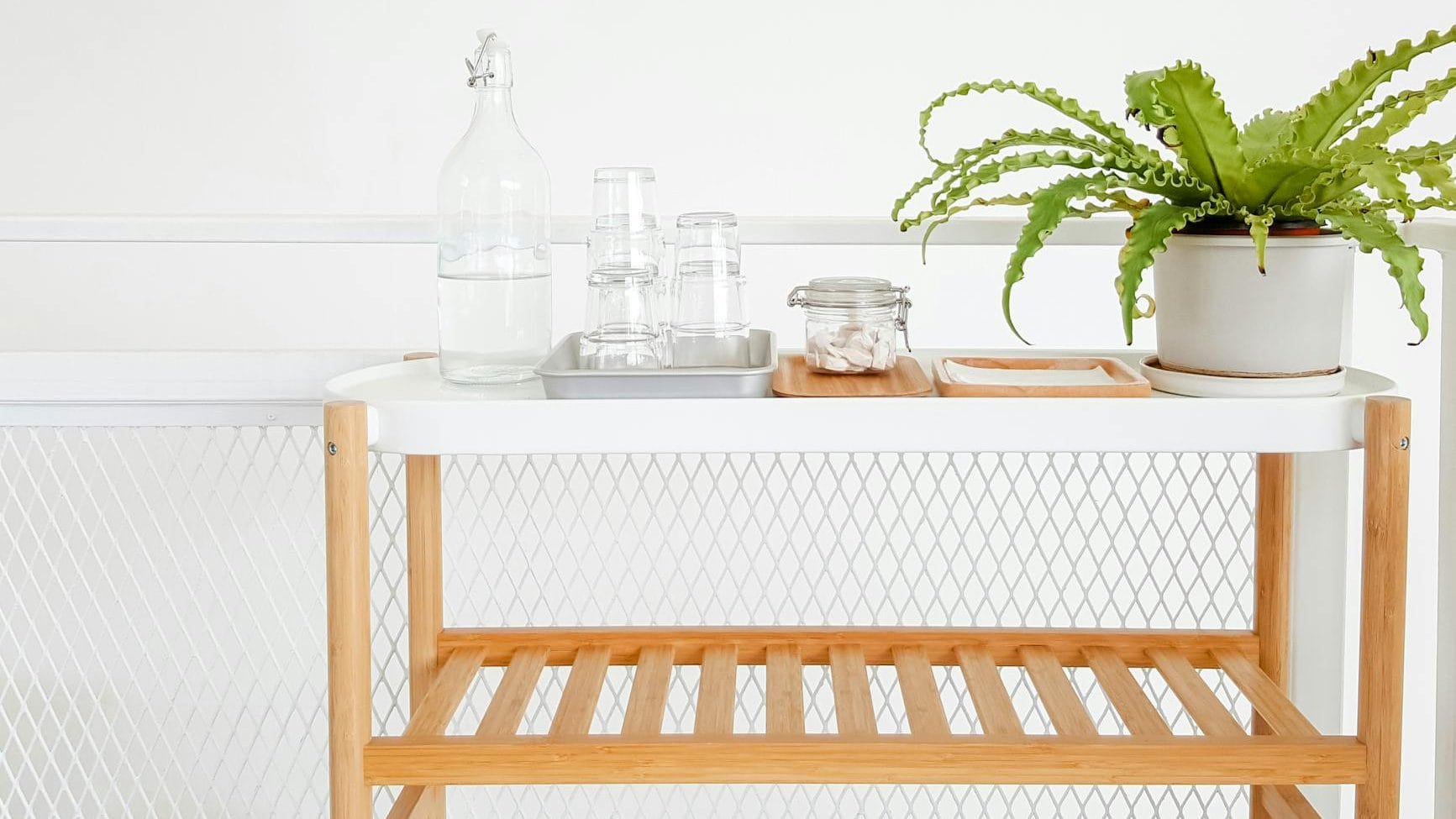 clear glass bottle on table