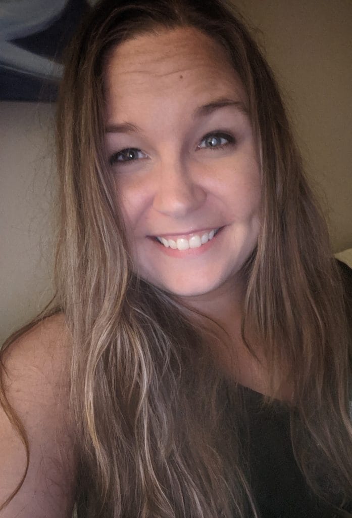 Photo of author smiling in 2022, prior to receiving care
