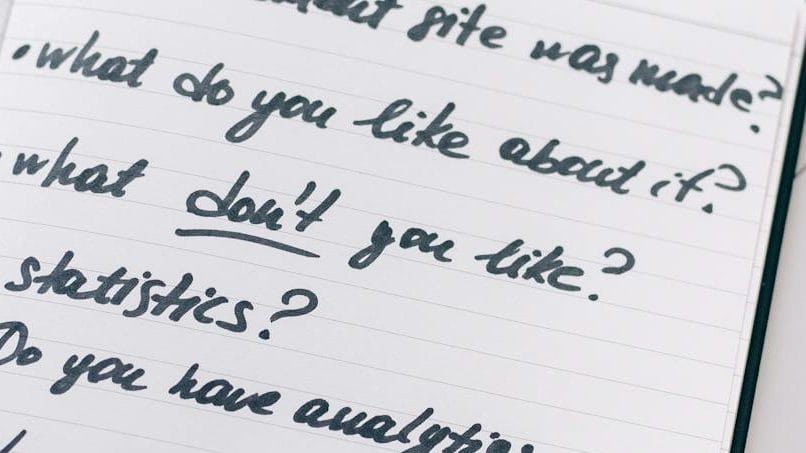 feedback questions on a open notebook.