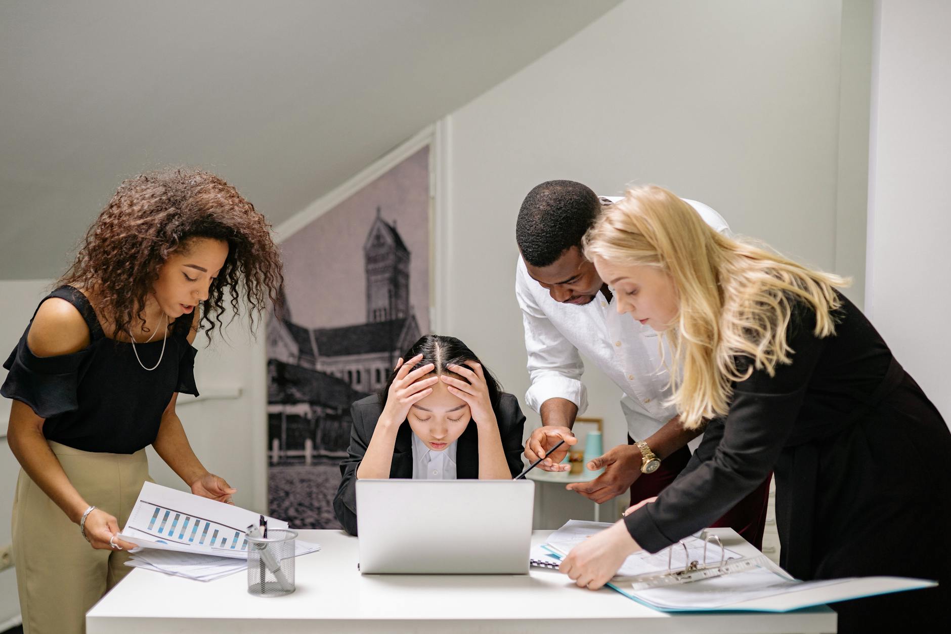 businessman man person woman, head in hands as a signs of burnout